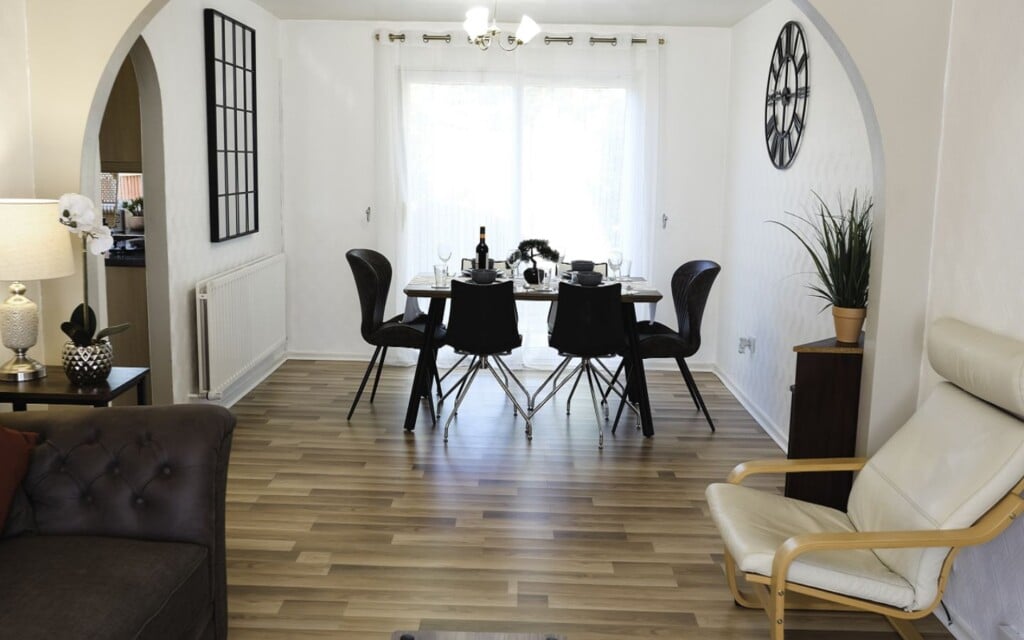 lodginet spacious white house dining area